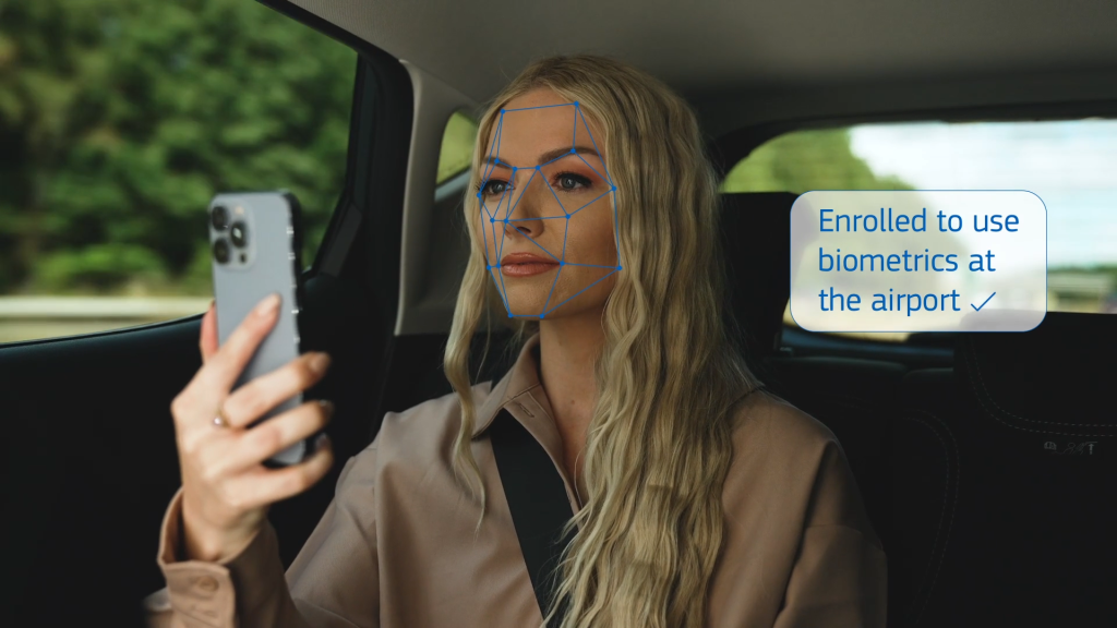 Amadeus Thumb woman in car scanning 3D model of her face