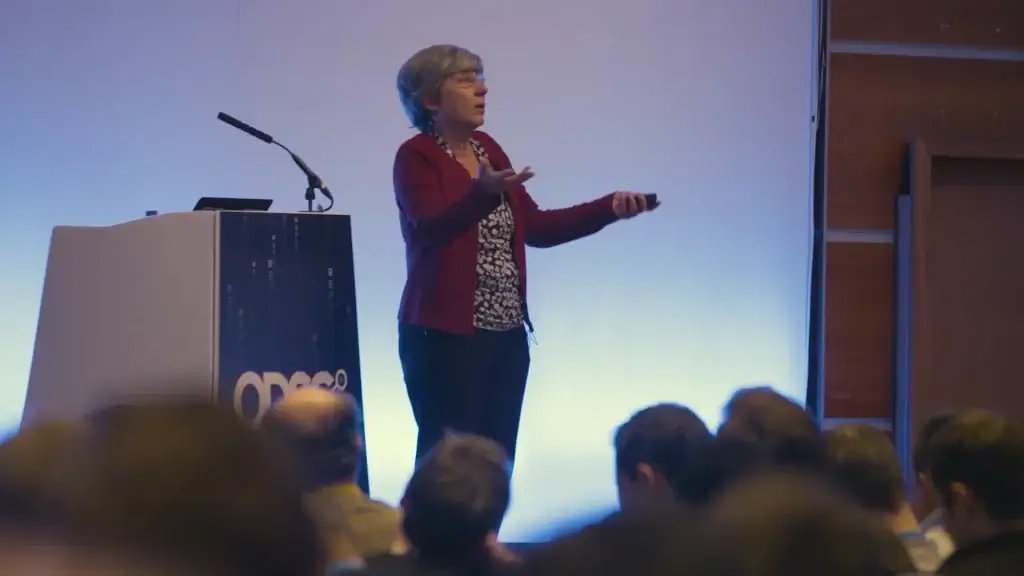 woman_speaking_at_event_being_filmed_live