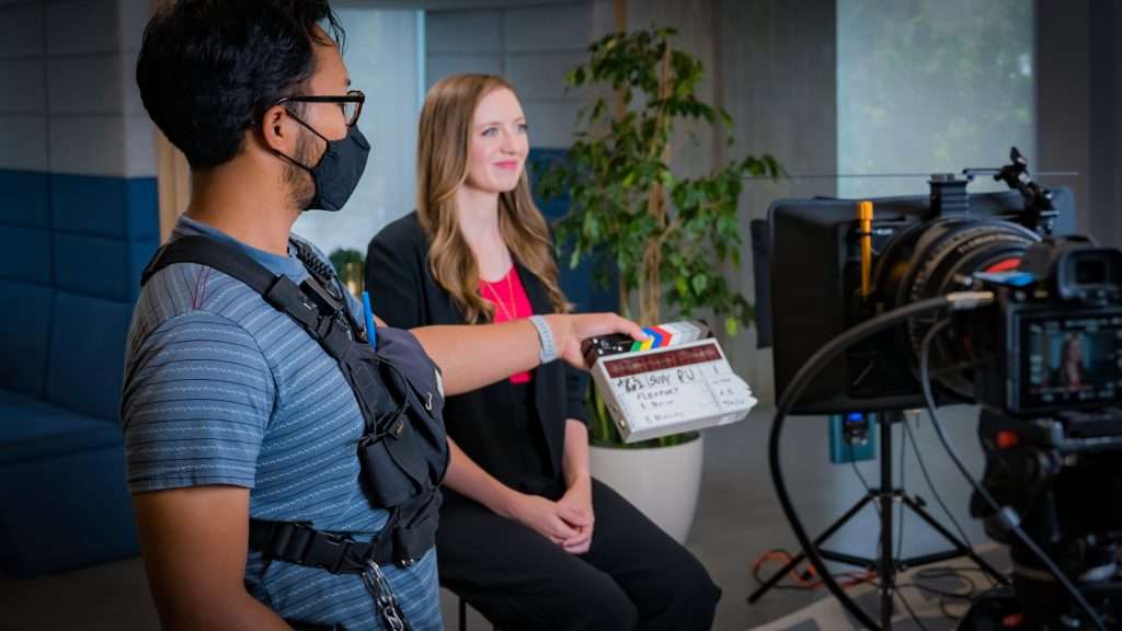 DSC07356 filming behind the scenes videos on set with a clapper bord and a camera
