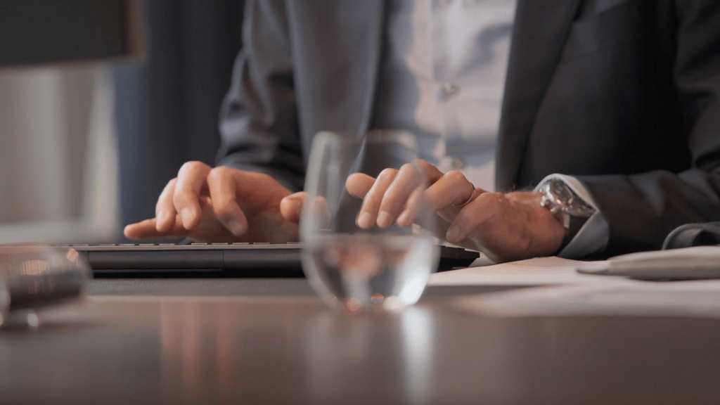 businessman typing on keyboard