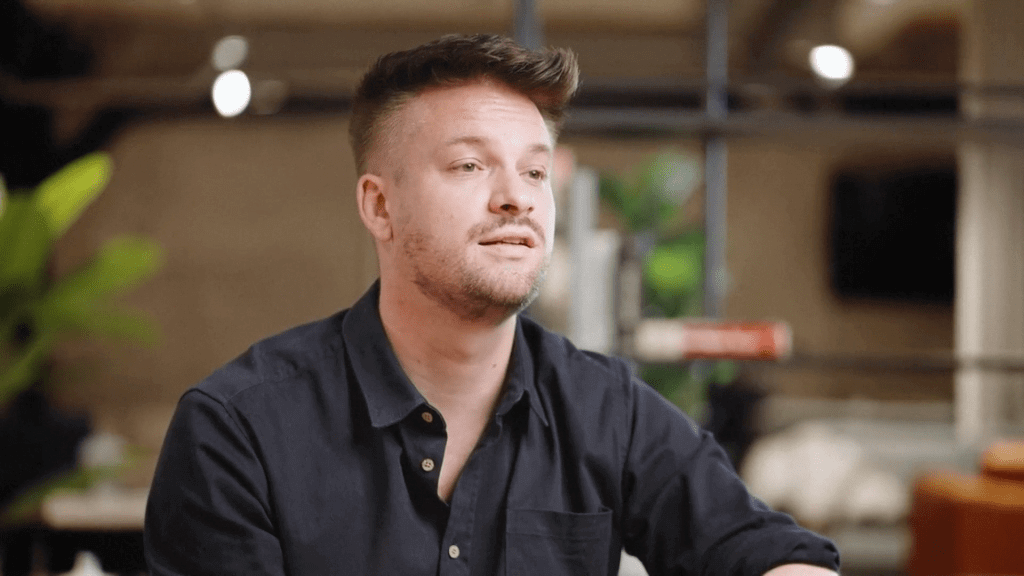 avatar ai thumb 3 AI avatar presenter in a modern corporate office setting